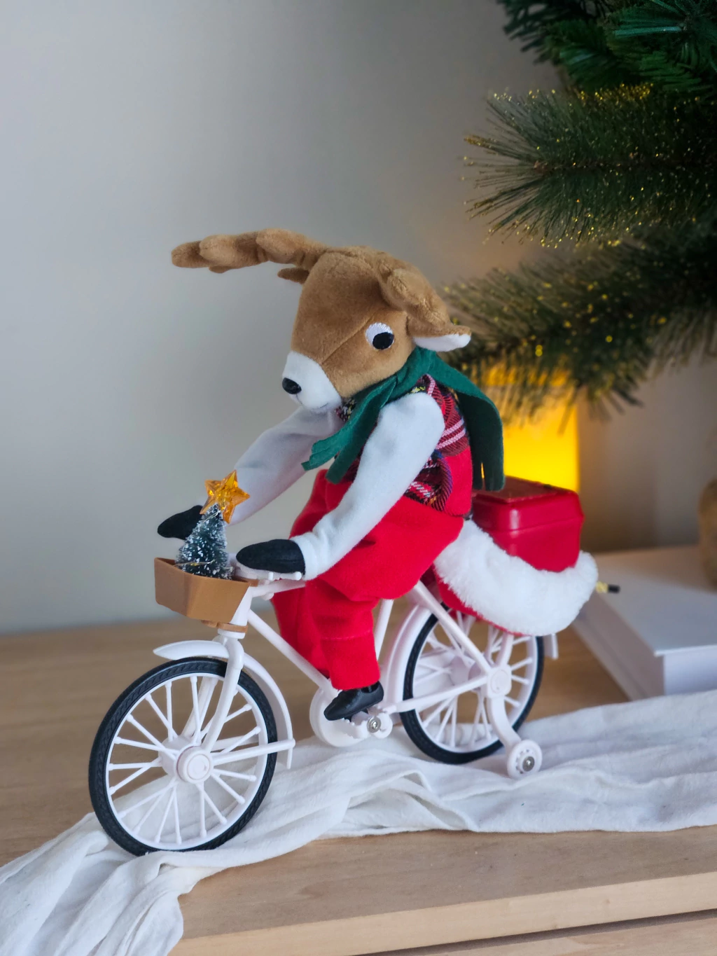 Reno de Peluche en Bicicleta