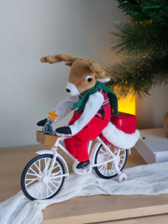 Reno de Peluche en Bicicleta
